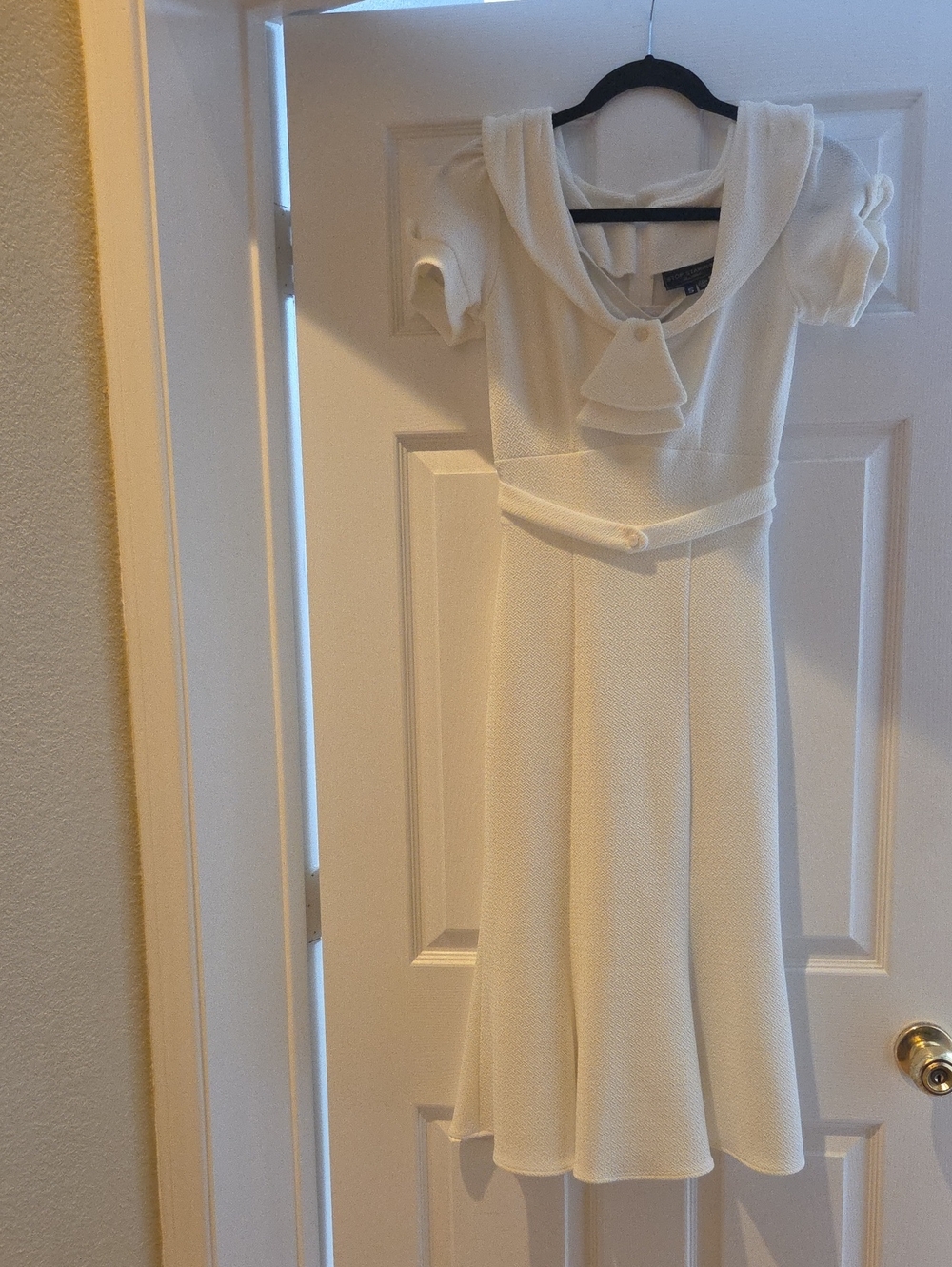 Stop Staring! Cream Textured Fit-and-Flare Dress with Bow Collar